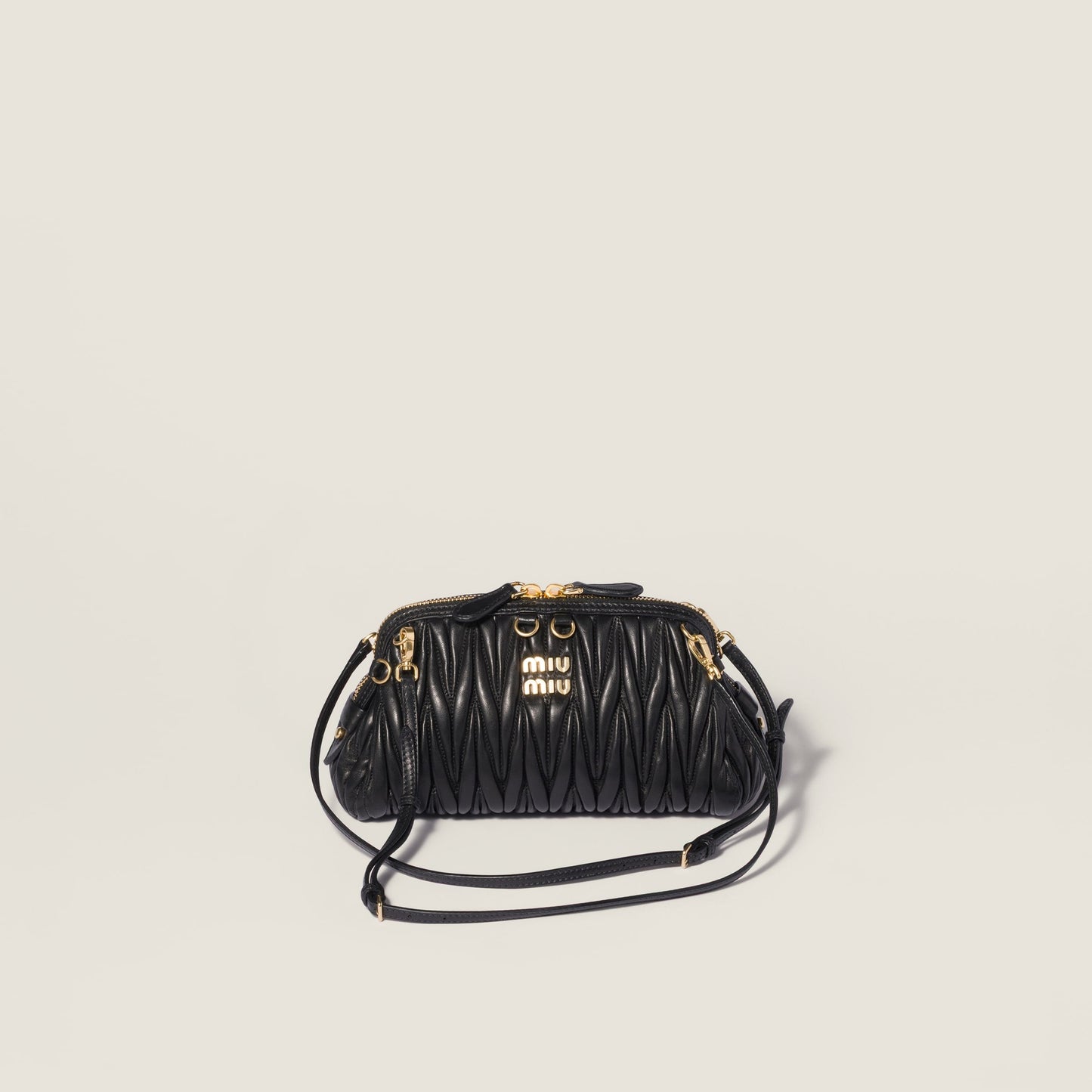 Caprice matelassé nappa leather clutch
