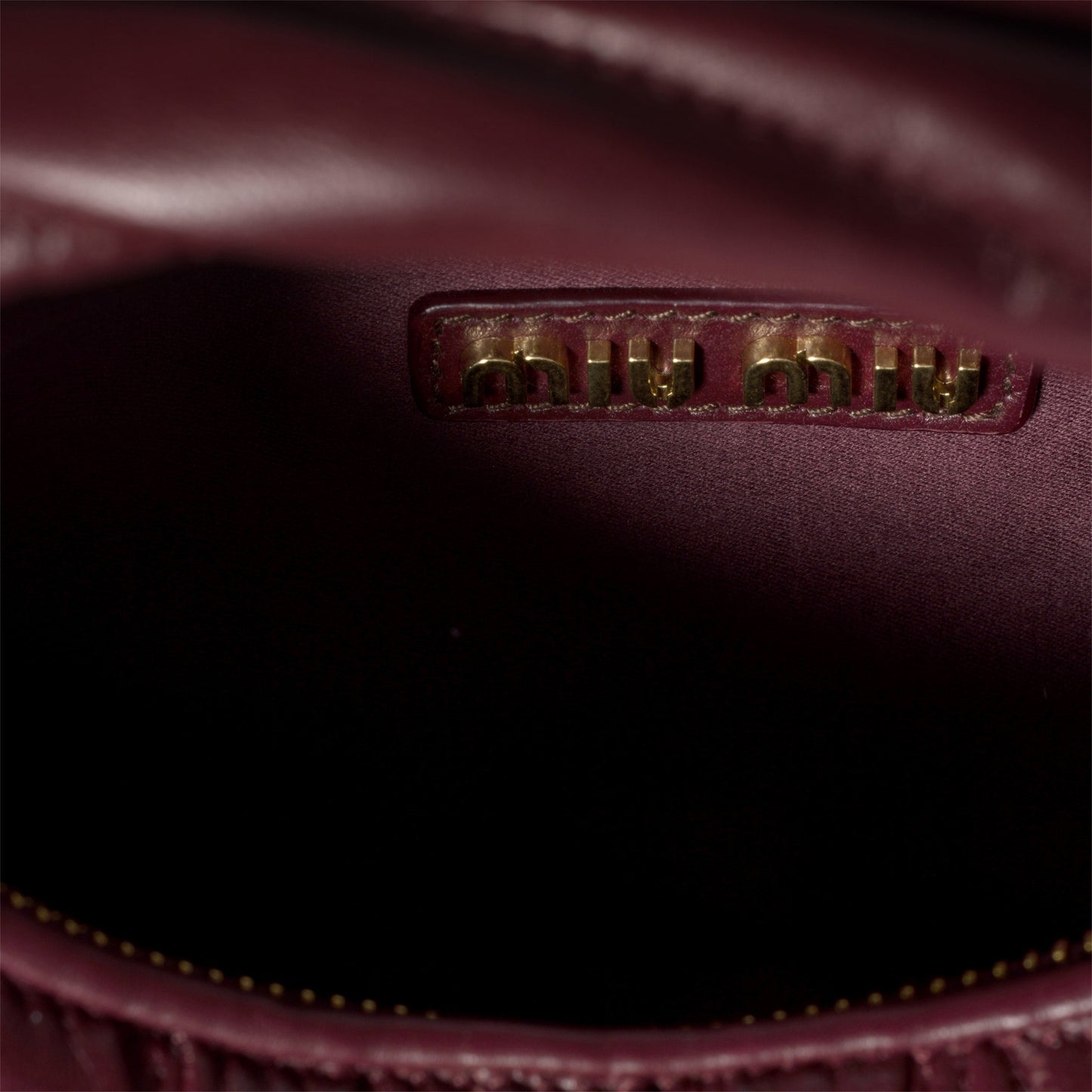 Wander matelassé nappa leather hobo mini-bag