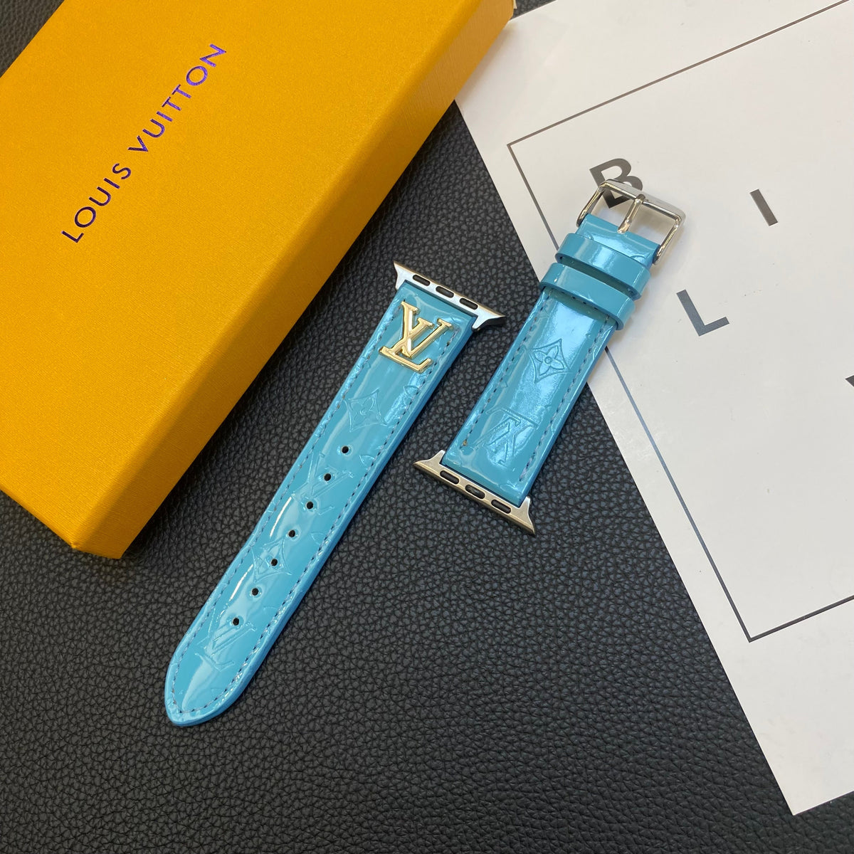 GLOSSY LEATHER APPLE WATCH STRAP LUXURY METAL LOGO